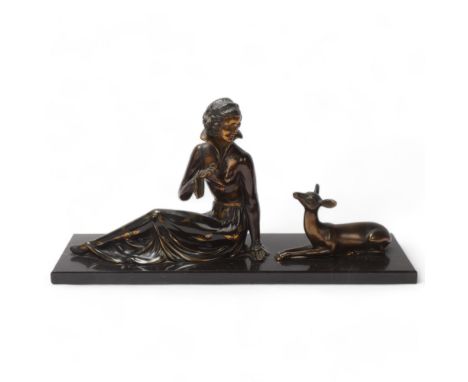 Art Deco gilded and patinated spelter figure of a woman with a fawn, on black marble base, unsigned, base length 50cmAll in g