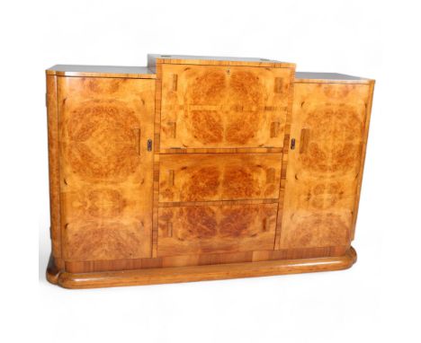 Art Deco burr-walnut cocktail cabinet, circa 1920s, central cocktail fall-front with rising top enclosing a slide-out interio