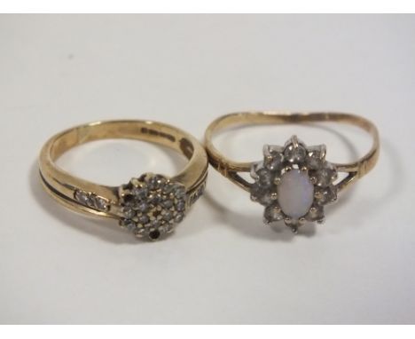 A 9CT GOLD RING SET WITH CLEAR STONES A/F TOGETHER WITH A 9CT GOLD OPAL RING