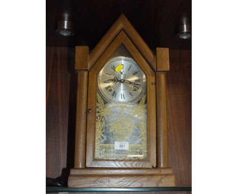 A MODERN BEEHIVE STYLE MANTEL CLOCK