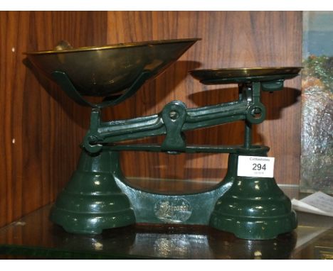 A SET OF VINTAGE WEIGHING SCALES WITH BRASS WEIGHTS  
