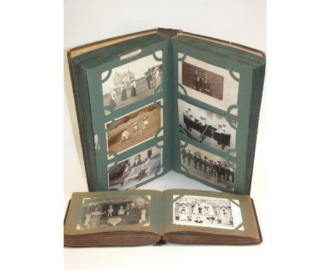 TWO ALBUMS OF ANTIQUE AND VINTAGE POSTCARDS