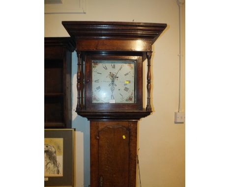 AN ANTIQUE OAK LONGCASE CLOCK WITH 30 HOUR MOVEMENT BY J.V TIBBOTTS OF VEWTOWN