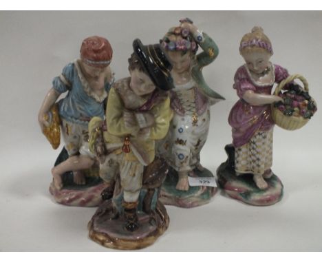 A SET OF FOUR CONTINENTAL CERAMIC FIGURES