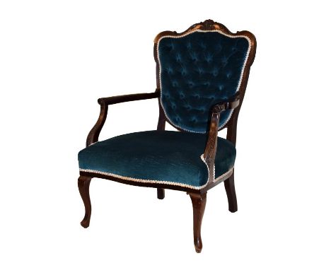 Late 19th Century mahogany open arm drawing room chair having acanthus carved cresting with button back upholstery and raised