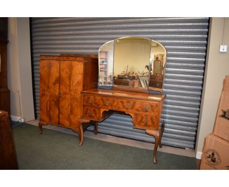 1920's period walnut kneehole dressing table with mirror over together with a matching press cupboard fitted two doors enclos