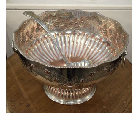 20th Century silver plated punch bowl having two loop handles and lion mask together with a ladle   Condition: 
