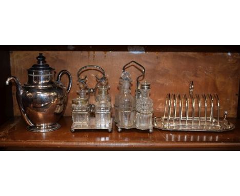 Royles patent self pouring teapot, two cruet sets and a toast rack (one shelf)   Condition: 