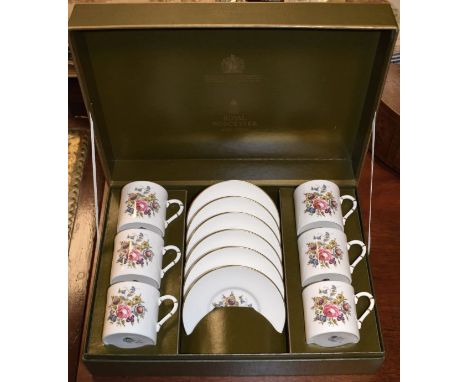 Royal Worcester bone china transfer printed floral decorated six person coffee set, cased   Condition: 