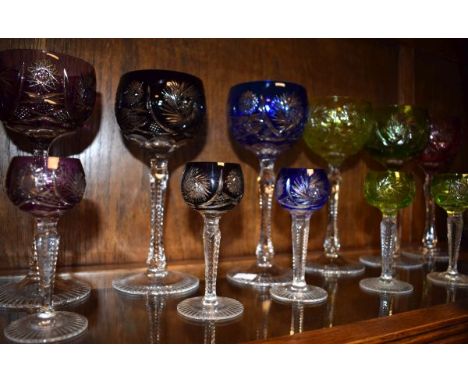 Set of six Continental cut hock glasses, each having a different coloured bowl together with a set of six smaller similar gla