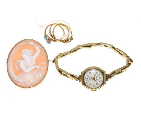 Graduated three stone diamond ring, two other dress rings, 9ct gold cased cocktail watch having gold plated bracelet and an o