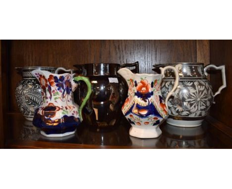 Three early 19th Century silver lustre jugs together with two Gaudy Welsh jugs (part shelf)   Condition: 