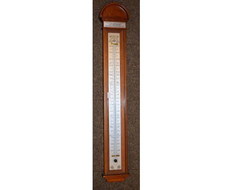 Two reproduction 'signpost' design barometers, one other brass barometer and a mahogany cased thermometer   Condition: 