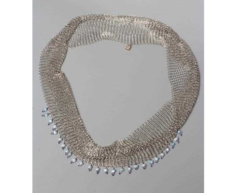 A MODERN SILVER CHAINMAIL LOOP 'SCARF' NECKLACE by Hamilton &amp; Inches, Edinburgh 2000, the single 'twist' necklace hung wi