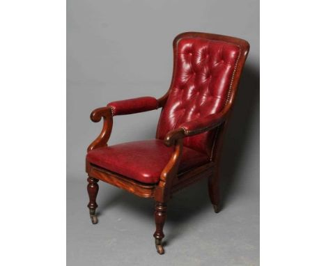A VICTORIAN MAHOGANY SHOW FRAME LIBRARY CHAIR, third quarter 19th century, button upholstered in red leather, mildly arched a