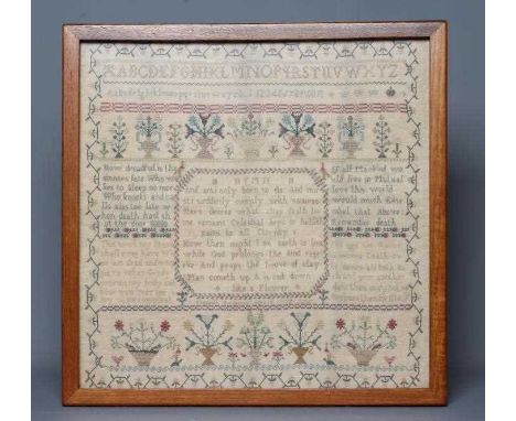 A LATE GEORGE III SAMPLER, 1797, worked by Elizabeth Brotherton, aged 10(?), in coloured silks in full cross stitch on a fine