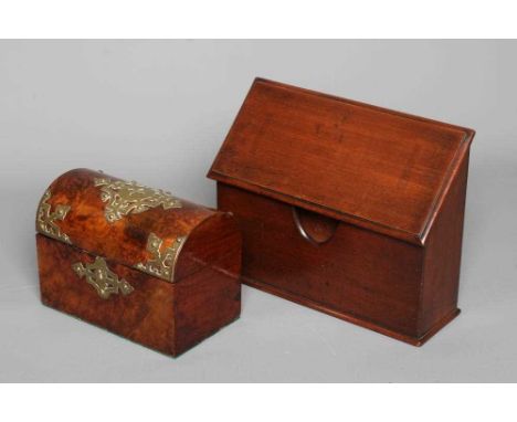 A LATE VICTORIAN MAHOGANY DESKTOP LETTER RACK with three stationery compartments and hinged sloping rectangular top, 9" h x 1