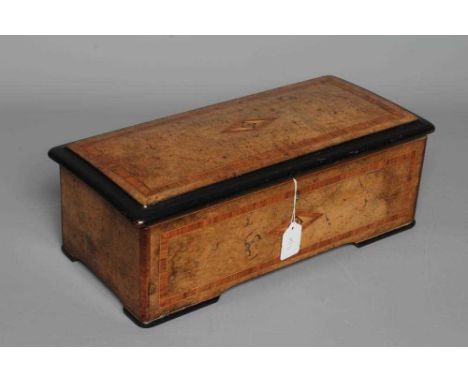 A SWISS MUSICAL BOX, late 19th century, the 8 1/4" cylinder and one piece comb playing seven airs as listed on the tune sheet