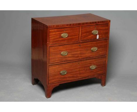 A GEORGIAN MAHOGANY STRAIGHT FRONT CHEST, early 19th century, with ebony edge stringing, the caddy top over two short and two