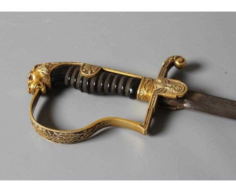 A GERMAN THIRD REICH ARMY OFFICER'S SWORD with 30 1/2" curved blade, hilt with reichsadlker langet, scroll quillon, oak leaf 