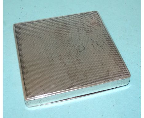A George VI lady's silver engine-turned compact with mirror, (mirror surround loose), by Dyas Beverley Hampton, 7x7cm, London