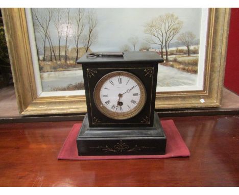A Victorian slate mantel clock with key, 23cm tall