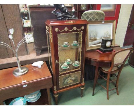 A French style glazed display cabinet with ormolu mounts, hand painted panel and ceramic inserts, 130cm height x 54cm width x