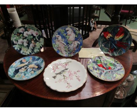 Five Wedgwood bird plates and a Royal Worcester limited edition Dorothy Doughty bird plate with booklet