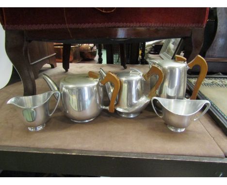 A five piece Piquot Ware tea and coffee set