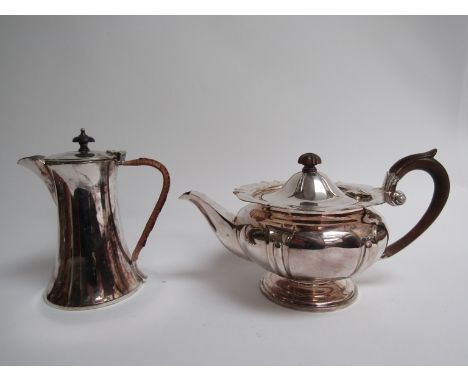 An Art Nouveau silver plate teapot and an Arts &amp; Crafts coffee pot (2)  