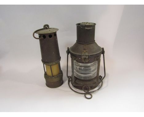 A Davy miner's lamp and a ships lamp