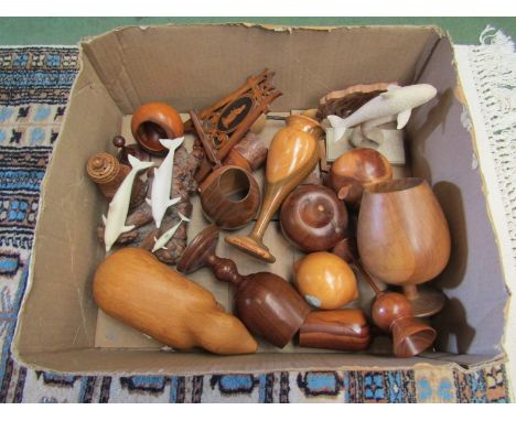 A collection of treen including cups, fruit and miniature easel 
