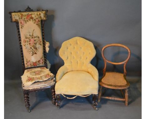 A Victorian Low Seat Chair With A Button Upholstered Back above a stuffover seat, raised upon carved cabriole legs, together 