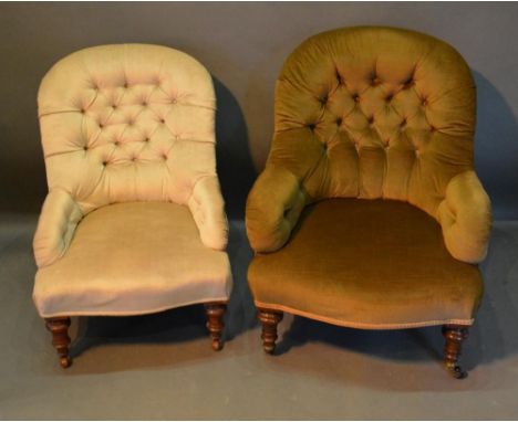 A 19th Century Drawing Room Chair With A Button Upholstered Back above a stuff over seat, raised upon turned tapering legs, t