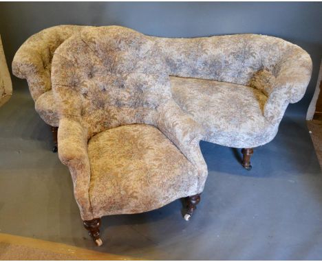 A Victorian Shaped Sofa with a Button Upholstered Back above a Stuff Over Seat raised upon turned legs together with a simila