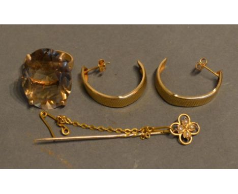 A Yellow Metal Dress Ring Set Large Oval Stone, together with a pearl set stick pin and a pair of half hoop earrings 