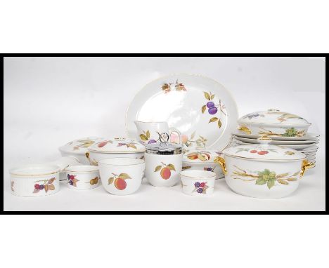 A Royal Worcester  Evesham pattern dinner service complete with plates, tureens etc. All being stamped to the underside