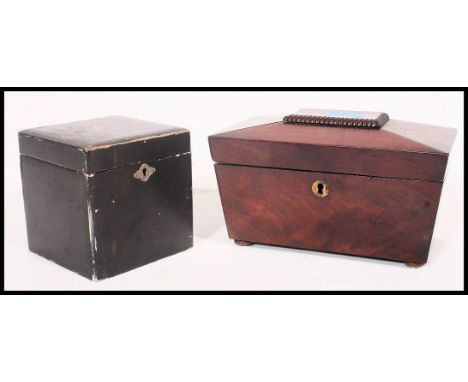 A Victorian mahogany small sarcophagus shaped tea caddy with hinged top together with a 1920's Japanese chinoserie laquered t