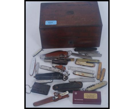A collection of vintage pen knives to include military Swiss Army etc please see images