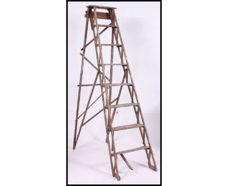 A vintage mid 20th century wooden step ladder. H193 x W53 x D110 cm 