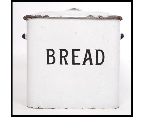 A vintage enamel bread bin, with lid, marked ' Bread ' to front. H31cm 