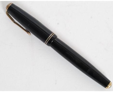An American black and gold trim finished Geo S Parker '  Parker Vacumatic ' fountain pen with arrow parker nib. 
together wit