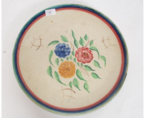 A large Shorter & Sons ceramic charger  decorated with a floral spray to centre with banded borders and in the manner of Clar