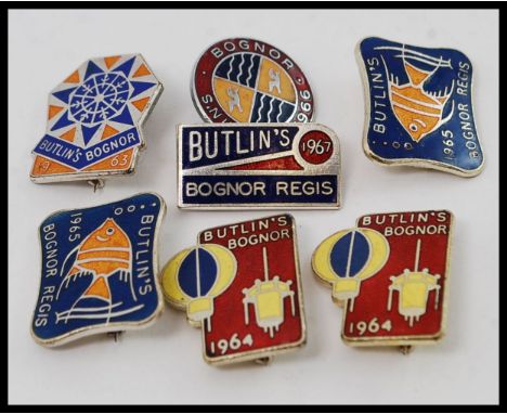 A collection of vintage mid century Butlins Bognor Regis enamel set badges to include 1963, 1964 x 2, 1965 x 2, 1966 & 1967