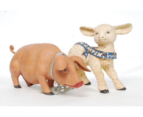 A vintage 1950's Advertising figurine of a lamp with notation for Lamtex together with an advertising figurine of a pig. L43 