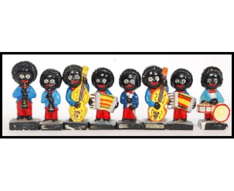 A collection of 8x vintage Robinsons Golly plaster band members. 
