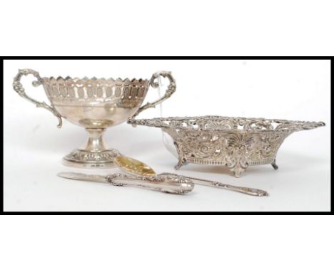 A Victorian silver plated caddy spoon inscribed to verso for 1887 marked Jurst together with a silver handled stilton knife a
