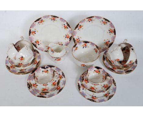 A good early 20th century Imari pattern tea service comprising cups saucers plates etc by Anchor China