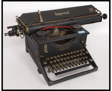 An early 20th century vintage manual typewriter by Imperial, having an A3 roller, please see images