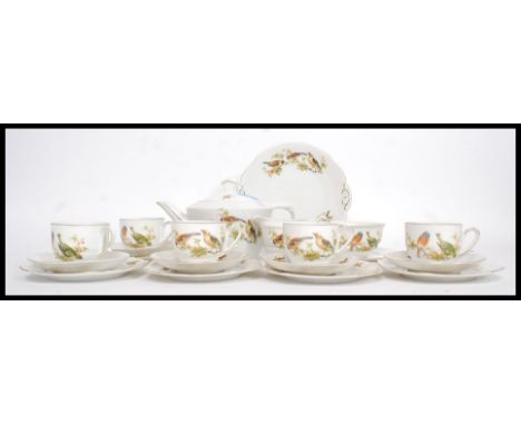 A vintage ' Victoria ' Czechoslovakian made china tea service, each piece decorated with birds and foliage. 